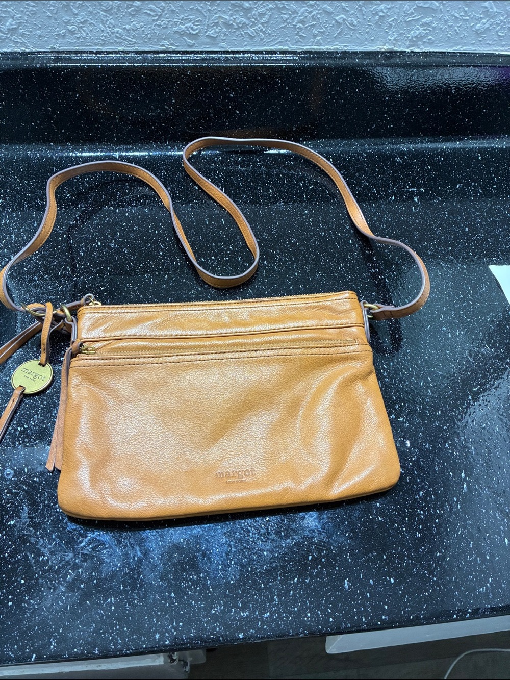 margot Tan Leather Crossbody Purse with Branded Charm